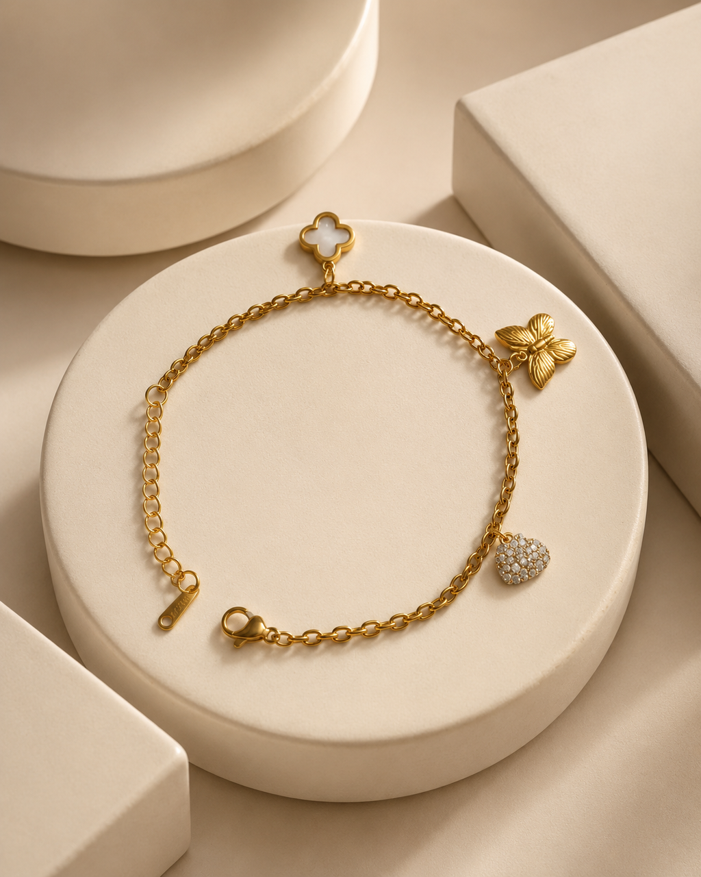 Clover, Butterfly & Crystal Heart Charm Gold-Plated Bracelet