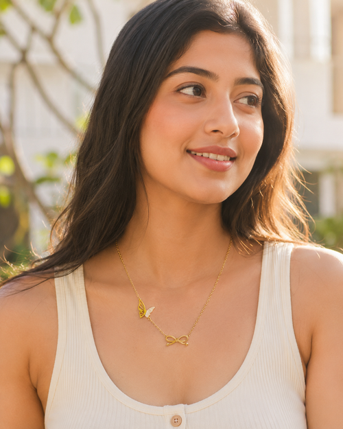 Gold-Tone Butterfly and Bow Charm Necklace with White Accent for Women