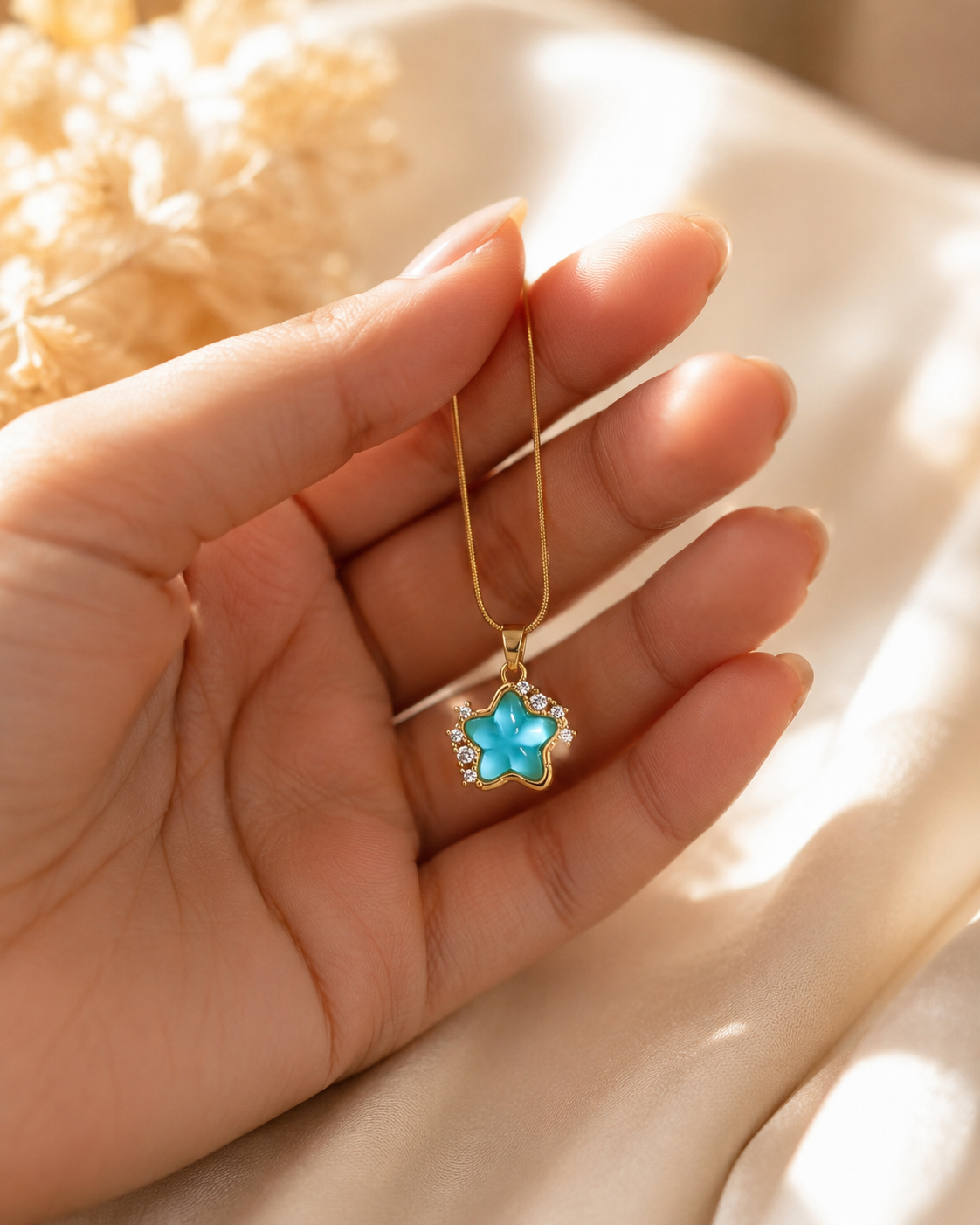 Gold-Plated Aqua Blue Star Pendant Necklace with Crystal Accents