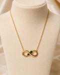 Gold-Plated Infinity Necklace with Green Crystal Accents