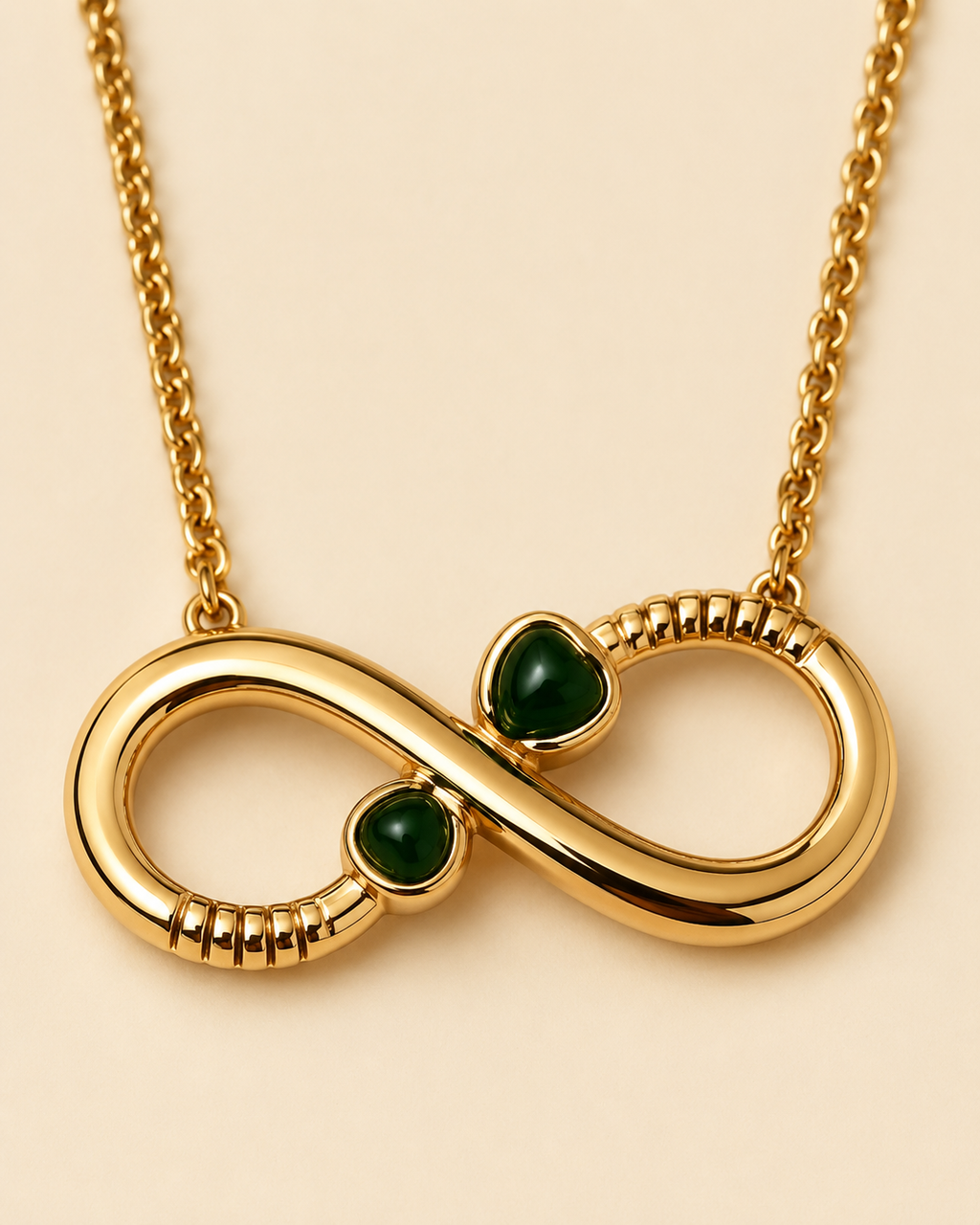 Gold-Plated Infinity Necklace with Green Crystal Accents