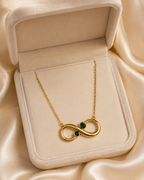 Gold-Plated Infinity Necklace with Green Crystal Accents