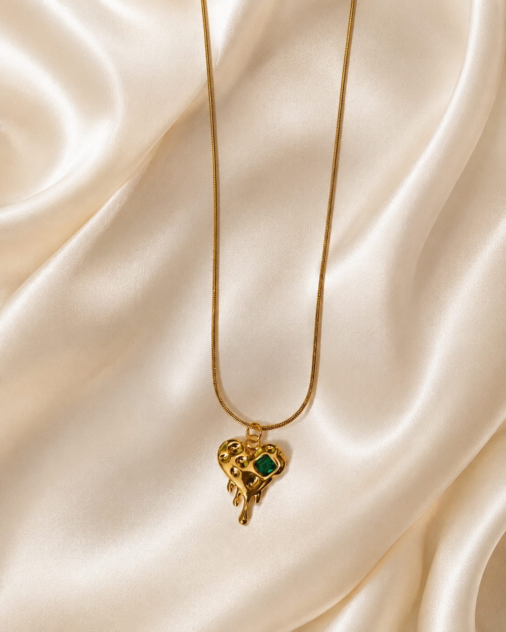 Gold-Plated Melting Heart Pendant Necklace with Green Crystal Accent