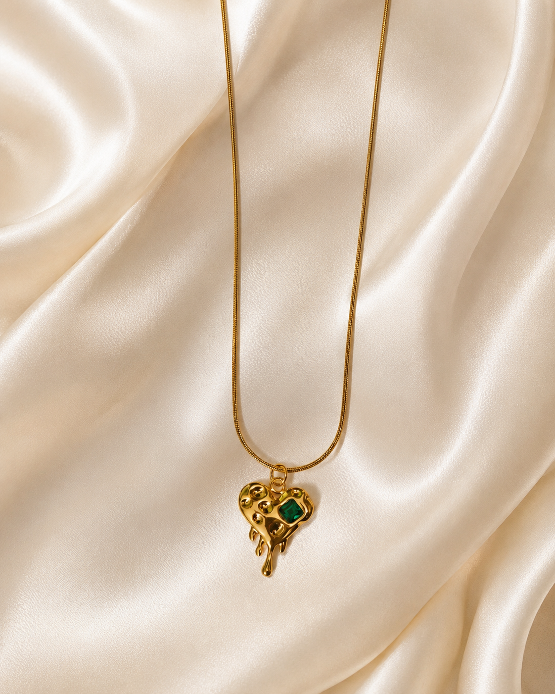 Gold-Plated Melting Heart Pendant Necklace with Green Crystal Accent