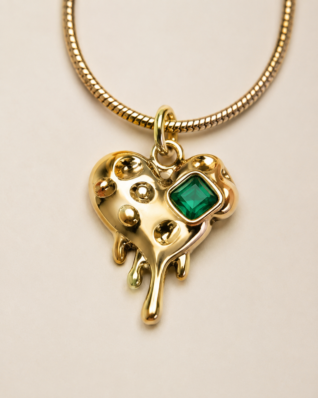 Gold-Plated Melting Heart Pendant Necklace with Green Crystal Accent