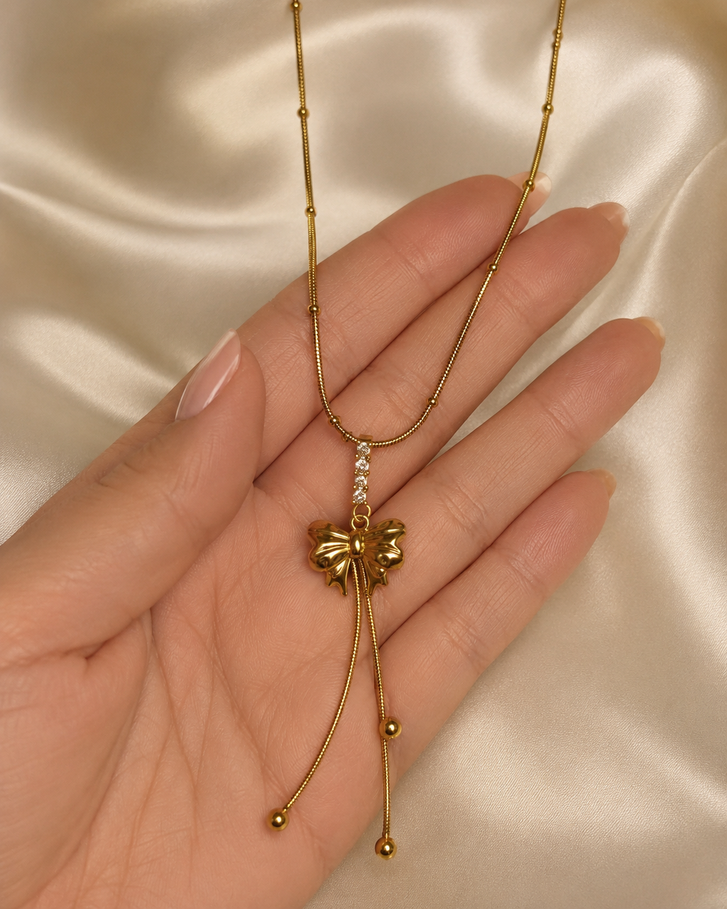 Elegant Gold Bow Tassel Drop Necklace