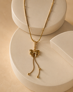 Elegant Gold Bow Tassel Drop Necklace