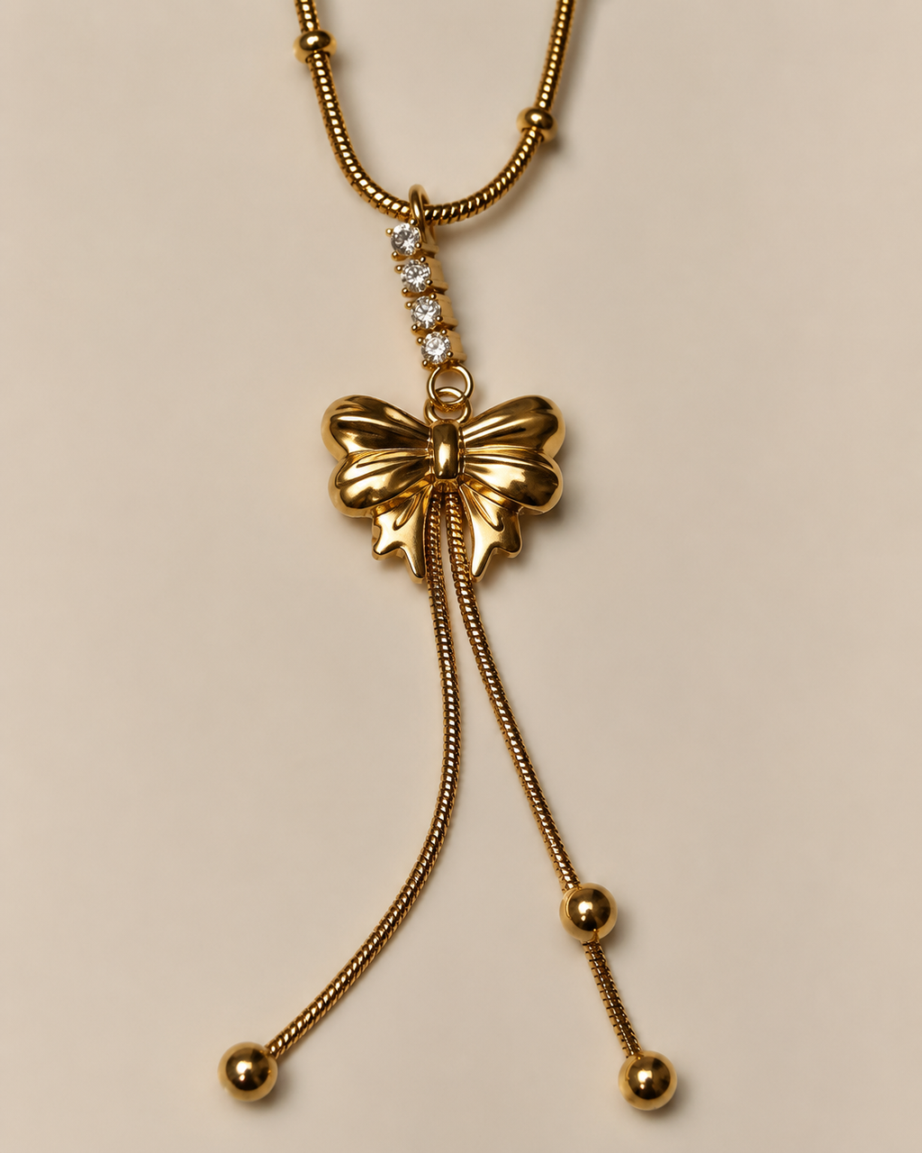 Elegant Gold Bow Tassel Drop Necklace