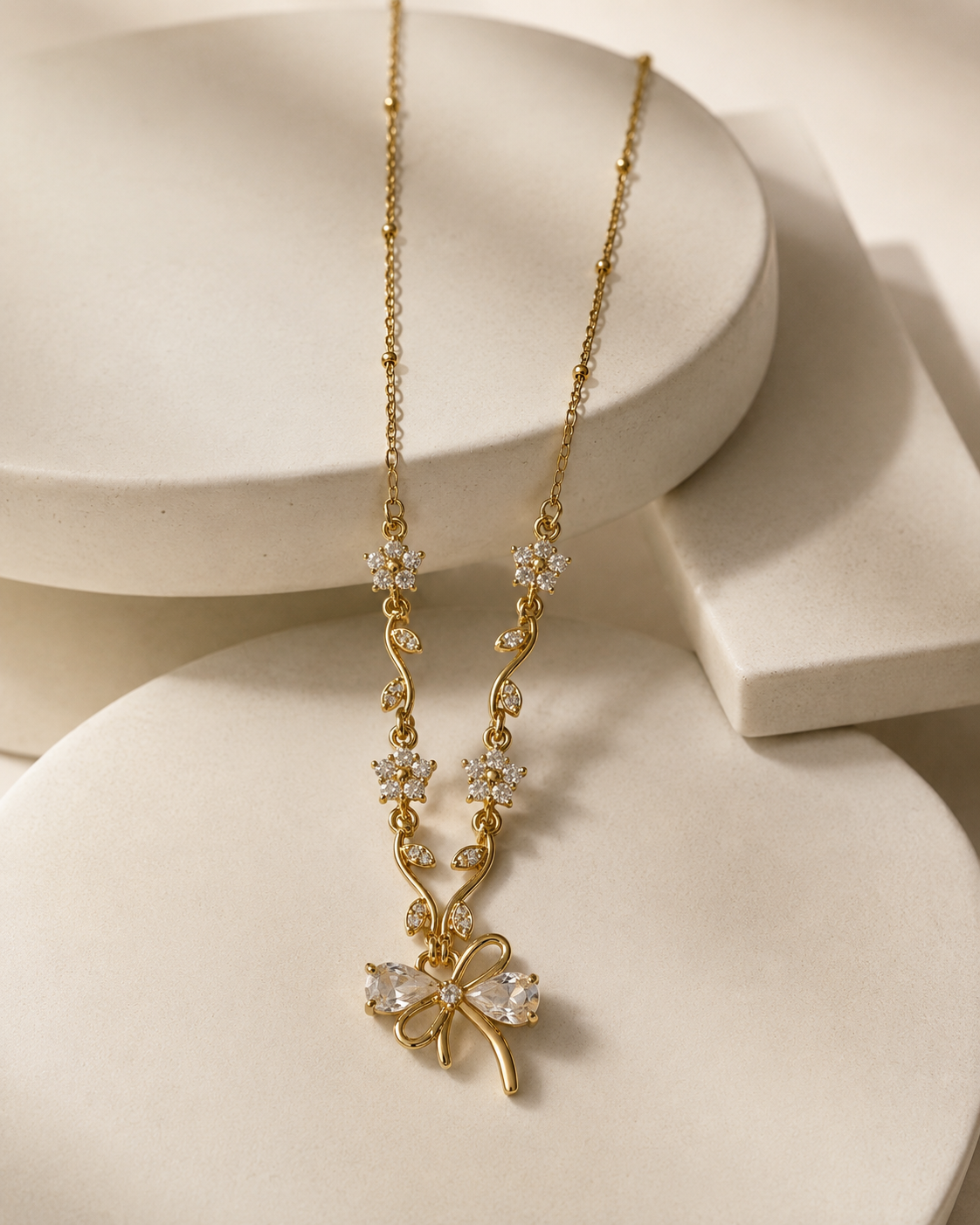Clear Floral Vine Bow Necklace