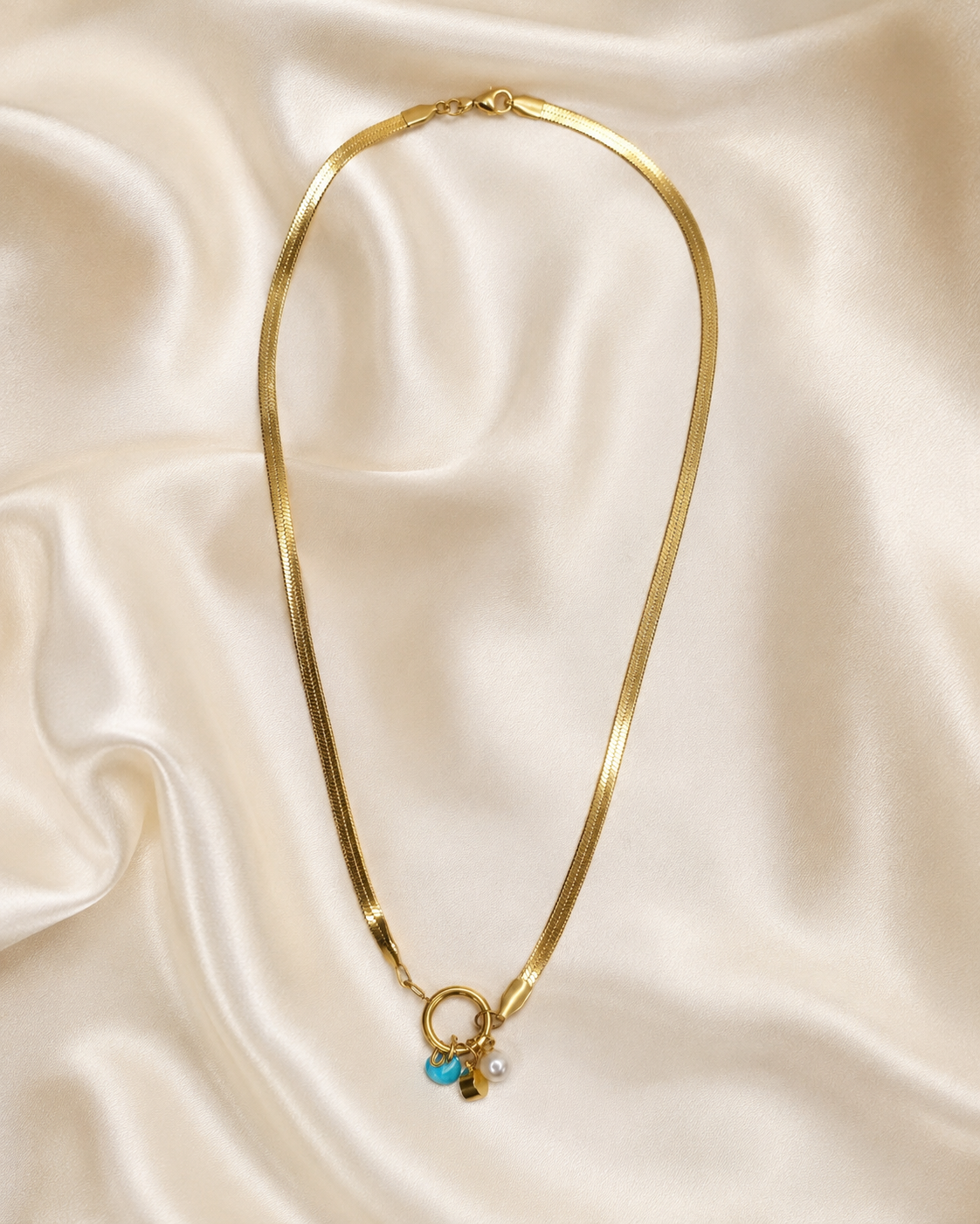 Gold Ring Charm Necklace with Pearl and Blue Bead