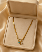 Gold Ring Charm Necklace with Pearl and Blue Bead